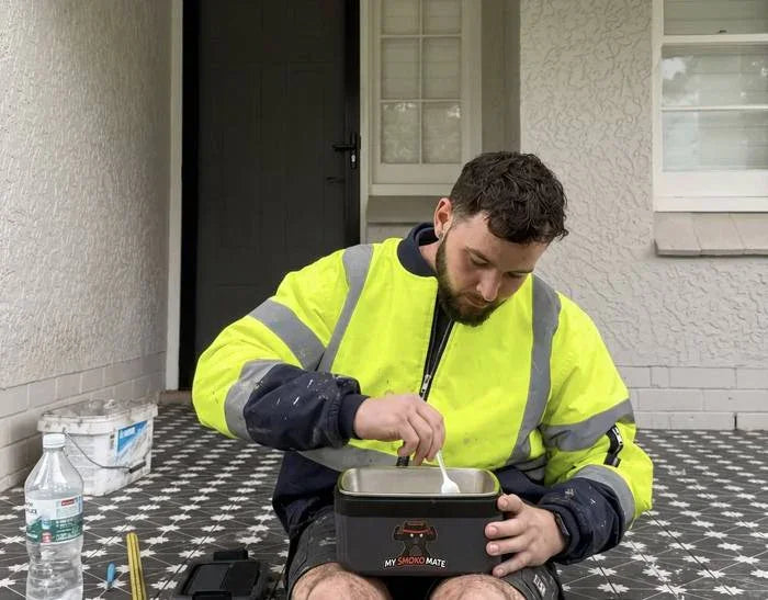 Australian worker sitting down to a hot meal at smoko